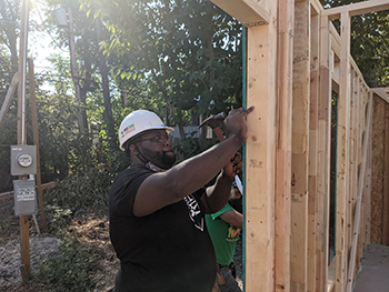 Bell & Corporate Employees Volunteer with Trinity Habitat for Humanity